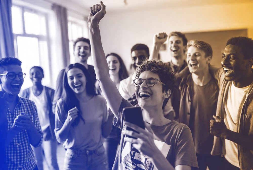 A group of learners celebrating exam success